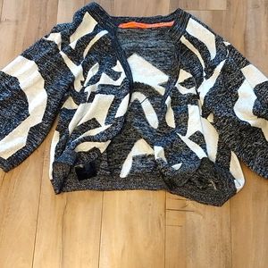 Patterned small stylish coat by Manning Cartel